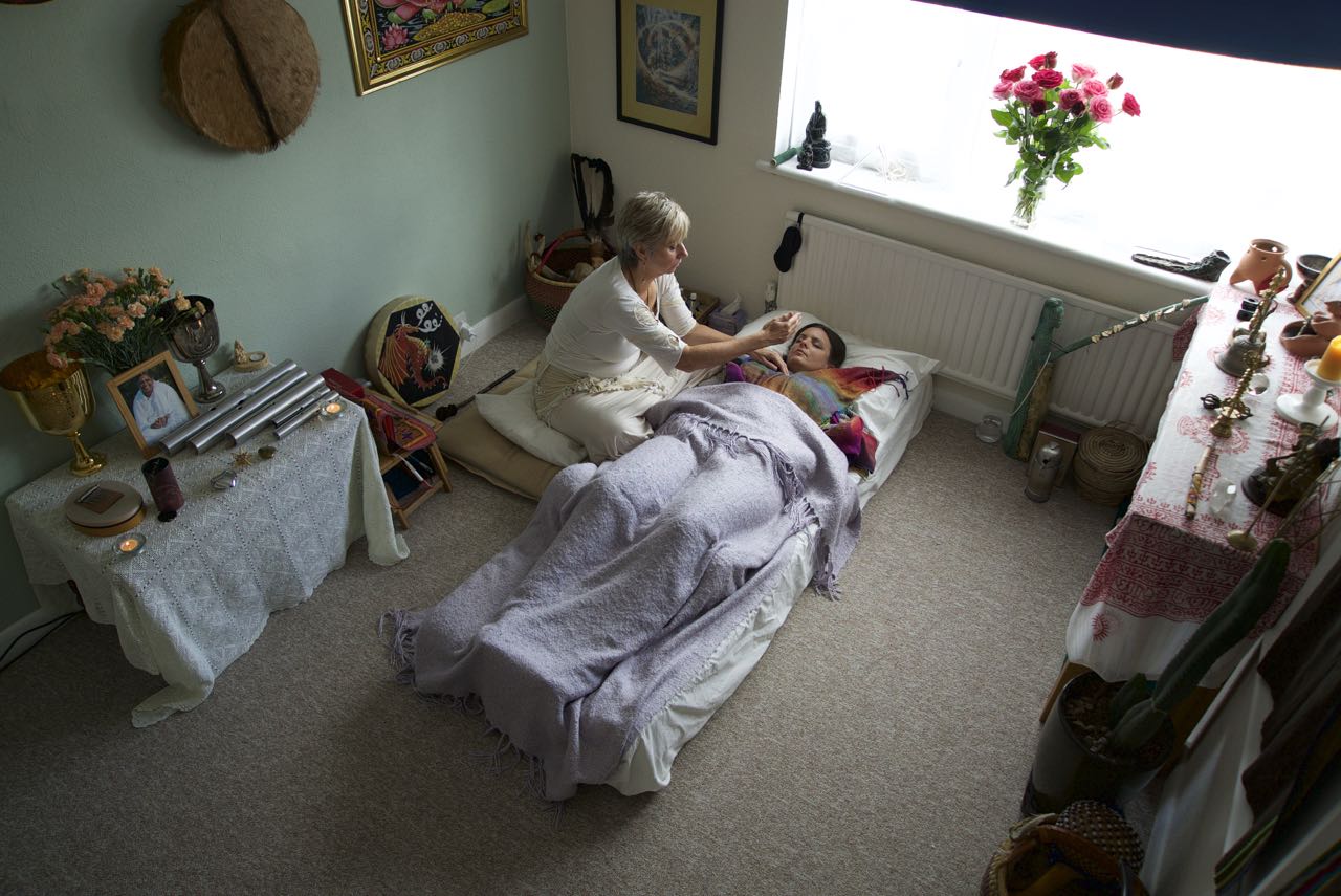 good 1 hs home copy Shaman Sue Holmes completing a session, smiling into the distance