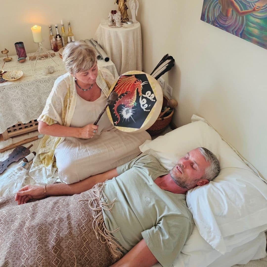 Shaman Sue Holmes completing a session, smiling into the distance
